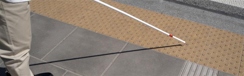Surface mounted tactile paving on public walkway
